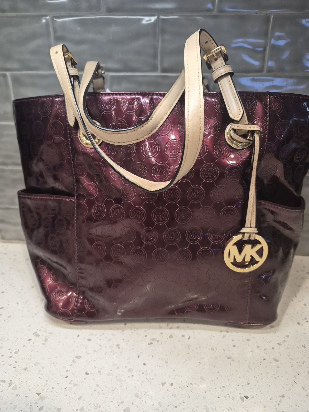 Michael Kors Metallic Plum Tote with Cream Handles and Gold Hardware